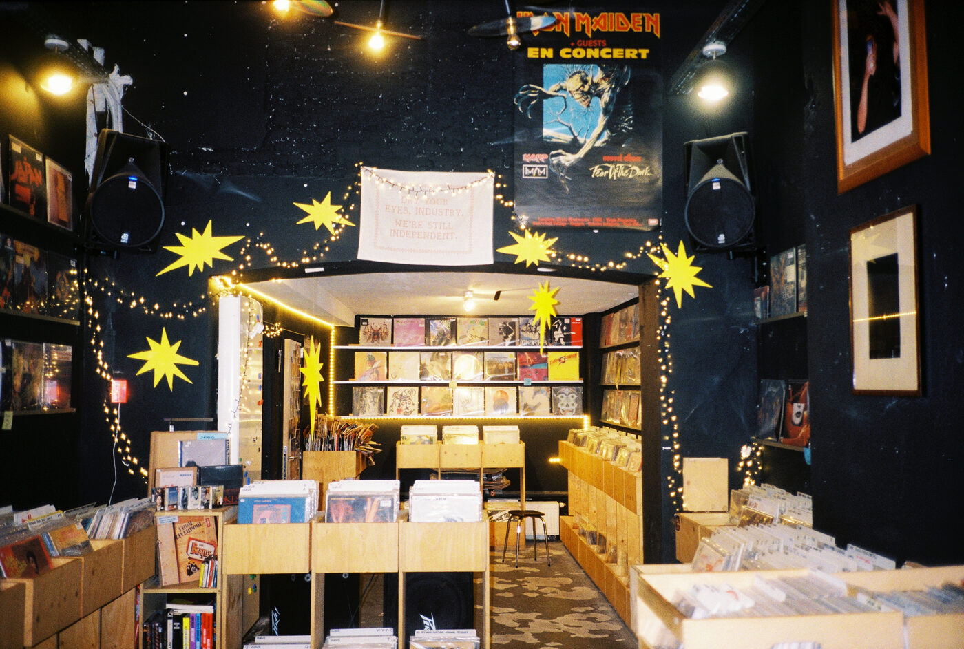 Interior of 72records — records on the walls, fairy lights